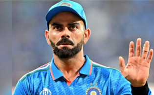 কোহলির রেস্তরাঁয় লুঙ্গি পড়ে ঢুকতে পারল না তুমুল কান্ড