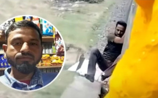 যে কারনে ট্রেন থেকে ঝোলানো হলো অটোরিকশা চালককে, ভাইরাল হলো ভিডিও